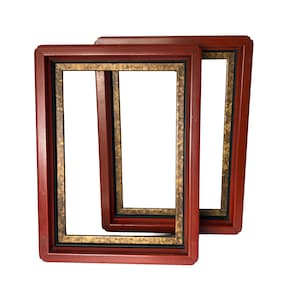 May include: Two rectangular picture frames with a rich, reddish-brown finish. The frames have a gold and black inner border, creating a layered effect. The frames are empty, ready for photos or artwork.