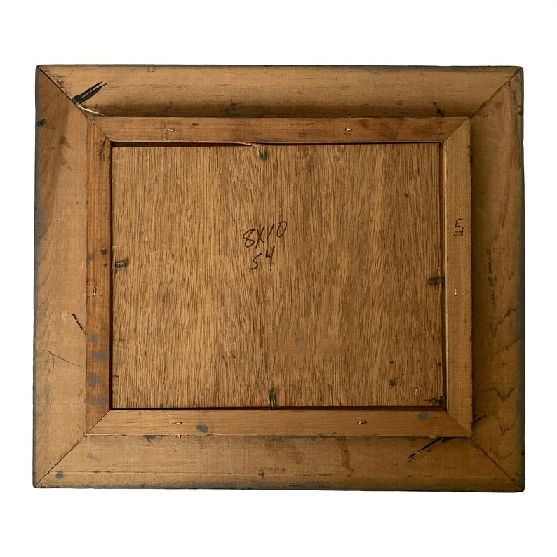 May include: Back of a framed artwork. The wooden frame is a light brown color with a darker brown border. The artwork's backing is a light brown wood. The dimensions are 8x10 inches, with the number 54 written below.