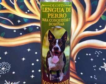 May include: A glass candle with a green label featuring a dog image and text. The text includes "Dog's Tongue" and "To Conquer and Dominate." The candle has a clear glass body and a silver-colored lid. The background is a colorful, patterned design.