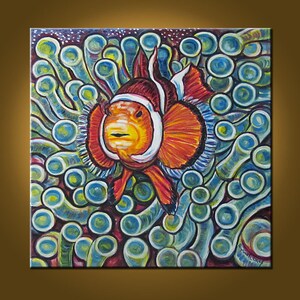 May include: A colorful painting of an orange and white clownfish swimming in a blue and green coral reef. The fish is surrounded by coral polyps and has a white stripe running down its side.