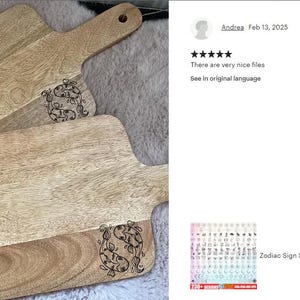 Puede incluir: Dos tablas de cortar de madera con los nombres grabados "Bernhard" y "Michael". Las tablas tienen un acabado de madera natural y presentan un dise&ntilde;o decorativo de dos peces.