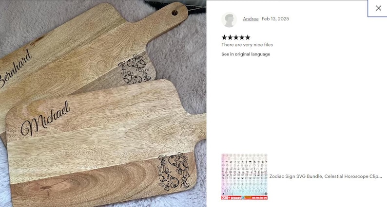 Puede incluir: Dos tablas de cortar de madera con los nombres grabados "Bernhard" y "Michael". Las tablas tienen un acabado de madera natural y presentan un dise&ntilde;o decorativo de dos peces.