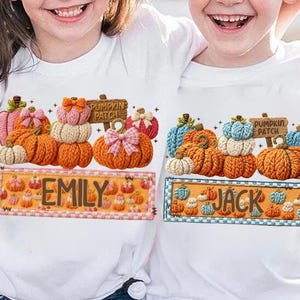 May include: Two white t-shirts with colorful pumpkin designs. One shirt says "Emily" and the other says "Jack". Each design features stacked pumpkins, bows, and a "Pumpkin Patch" sign, perfect for fall.