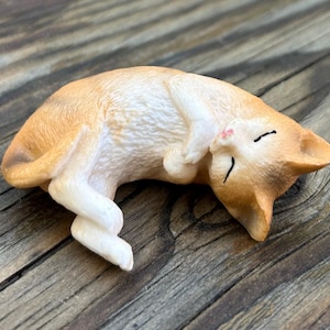 Miniatur schlafende Katze