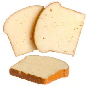 May include: Three slices of white bread, two are standing upright and one is lying flat.