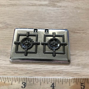 Gamma di piani cottura a gas in miniatura per casa delle bambole