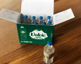 Paquete de agua en miniatura: el tipo que elijas