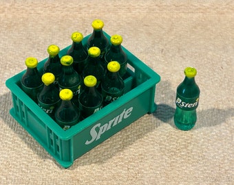 Botellas de refresco en miniatura en caja: el tipo que elijas