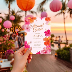 May include: A floral invitation card with the text "Sunset Soir&eacute;e" and details for a 21st birthday celebration. The card features pink and orange hibiscus flowers and is held in front of a blurred outdoor party scene.