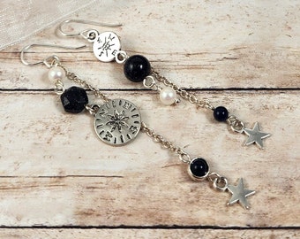 Asymmetric traveler earrings: compass, star, sky