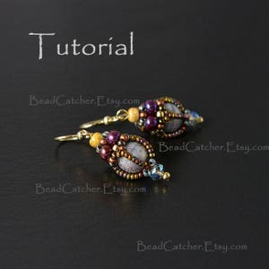 May include: A pair of beaded earrings with a teardrop shape. The earrings are made with a variety of beads in shades of brown, purple, and gold. The beads are arranged in a geometric pattern. The earrings are hanging from gold hooks.
