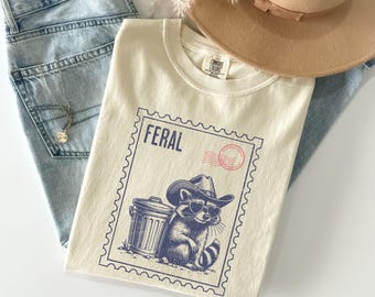 Funny Feral Cowboy Raccoon Graphic Shirt Comfort Colors® Trash Panda Feral Meme Shirts For Women, Funny Unhinged Cozy Racoon Lover Gifts