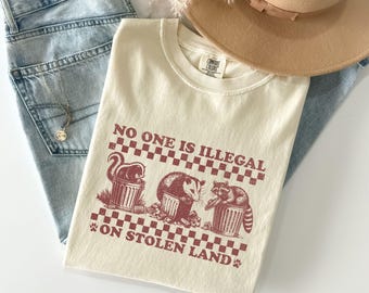 No One Is Illegal On Stolen Land Shirt, Immigration Shirt, Anti Racism Shirt, Activist Protest Shirt, Comfort Colors® Raccoon T Shirt