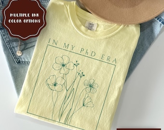 Chemise florale personnalisée pour l'obtention du diplôme de doctorat, jolie chemise de doctorat, cadeau de remise de diplôme de doctorat pour elle, t-shirt de doctorat, cadeau de remise de diplôme de doctorat pour étudiant en doctorat