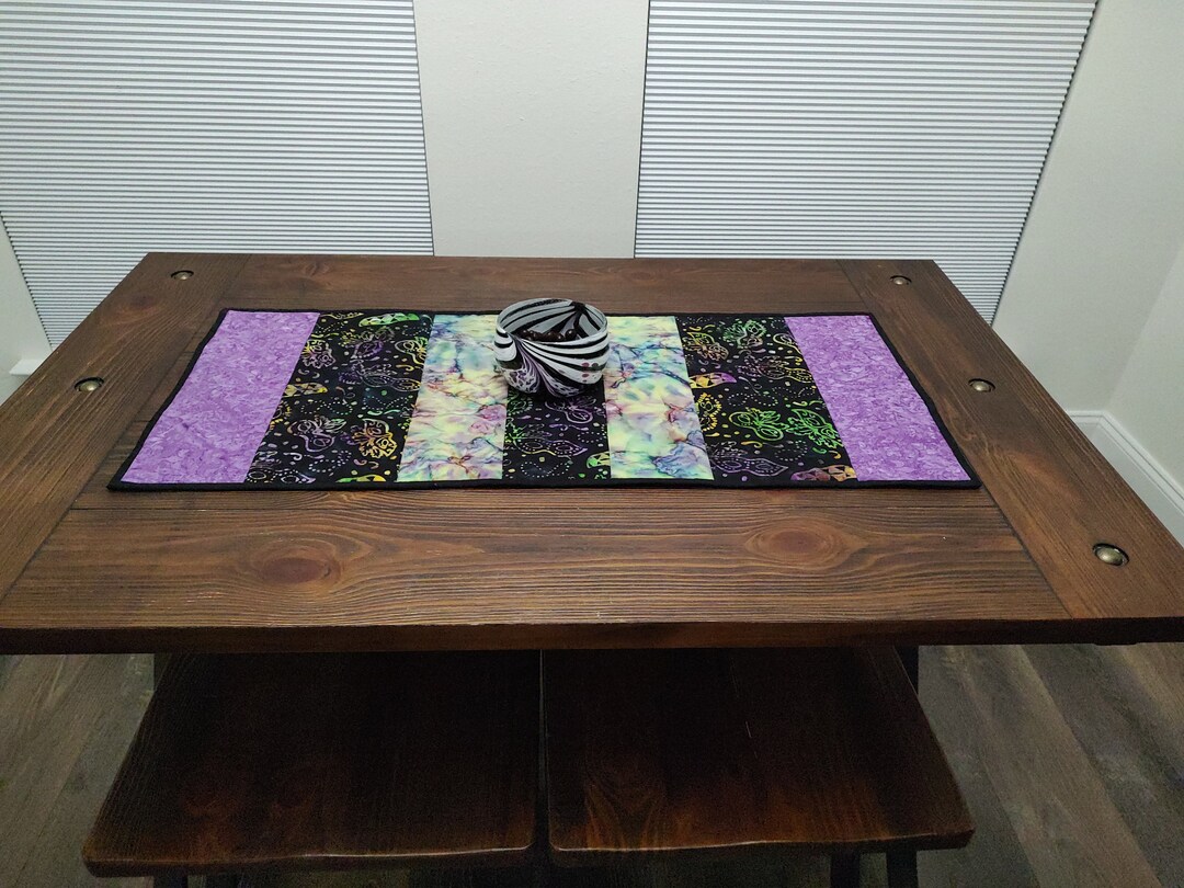 Mardi Delight Quilted Table Topper NCU0PTT2547