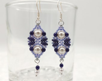 Boucles d'oreilles Jupiter violettes et blanches tressées en perles