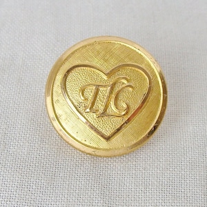 Vintage TLC in Heart Brass Uniform Button by Waterbury Companies Inc.