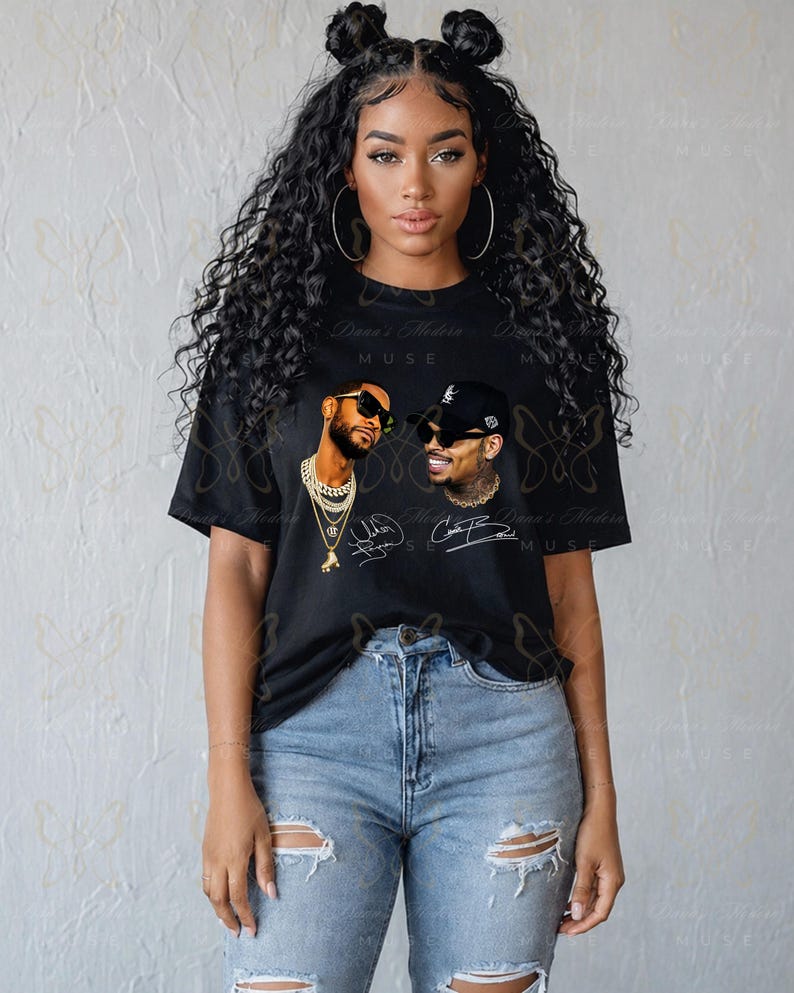 May include: A black short-sleeve t-shirt featuring a graphic print of two men wearing sunglasses and chains, accompanied by their signatures. The shirt is paired with light blue distressed denim jeans that have rips at the knees.