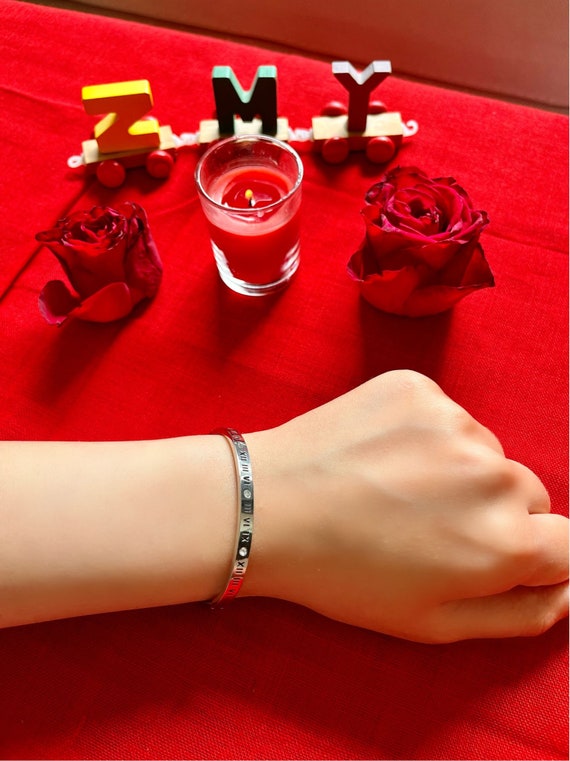 Cartier bracelet roman numerals hotsell