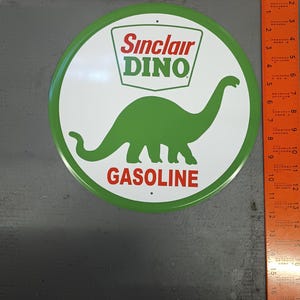 Sinclair Dino Tin Sign 12