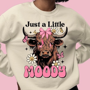Just a little moody png sublimation design download, hand drawn cow png,cute hefier png, cow with pink ribbon png,sublimate designs download