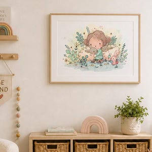 May include: A framed wall art print featuring a whimsical illustration of a child with two rabbits in a garden, displayed in a nursery room with a cream-colored armchair, a round wooden coffee table, woven storage baskets, and a plush sheep toy.