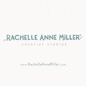 May include: A white graphic logo featuring the text Rachelle Anne Miller Creative Studios in a teal, hand-drawn font style. Below the main text, the website address www.RachelleAnneMiller.com is displayed in a smaller, simple teal font.