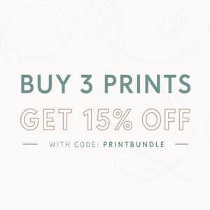 May include: A white graphic with sage green text that reads BUY 3 PRINTS, followed by the text GET 15% OFF in a beige outline font, and a final line of text that reads WITH CODE: PRINTBUNDLE, flanked by two horizontal sage green lines.