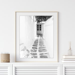 Greece photograph of a small cobblestone street and doorway. Black and white photography print.