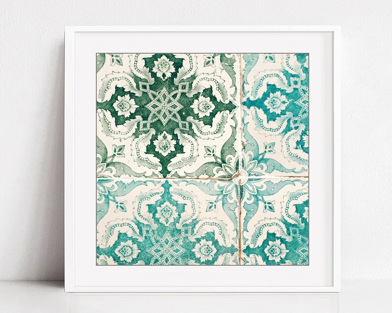 May include: A framed print of four green and white patterned tiles with intricate floral designs. The tiles are arranged in a square pattern.