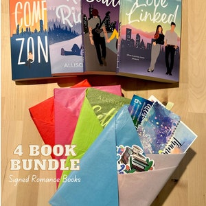 May include: A bundle of four signed romance novels wrapped in colorful tissue paper. The books are titled "Comfort Zone", "Keep Riding", "Settle Down", and "Love Linked". The bundle includes a sticker with a stack of books and a cup of tea.