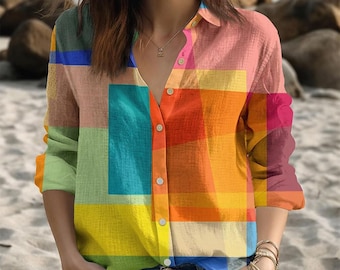 Kleurrijke blouse met abstracte kleurvlakken, artistiek geometrisch shirt met lange mouwen, levendige patchworkstijl button-down top, boho-zomerkleding