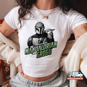 The Mandalorian And Grogu Baby Tee, Retro Star Wars Baby Yoda Crop Top, Vintage Sci Fi Fan Graphic T Shirt, Trendy Y2K Unisex Tee