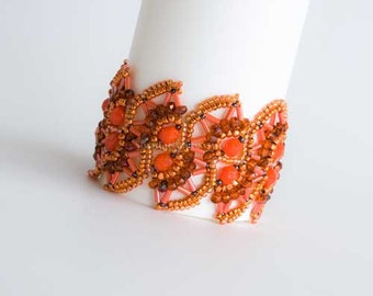 Colorful Lacy Bracelet in Tangerine Orange and Touches of Dark Blue with Beadwoven Toggle Clasp. Textured Double Fan S Shaped Bracelet. S-48