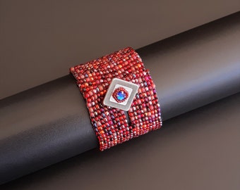 Rubi Red and Blues Shimmer Beaded Bracelet with Antique Silver Square Button Clasp with Sapphire Blue Crystal. Woven Textured Cuff S-479