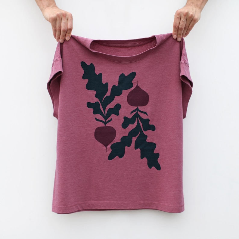Boxy women's t-shirt in heather red with red beets vegetable screenprint on the front.