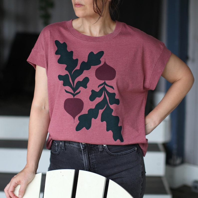Red beetroot botanical screenprint on a women's red boxy short sleeved t-shirt.