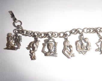 Pulsera vintage con dijes Coro, joyería figurativa de los Diez Mandamientos, 8.5" (bisutería)