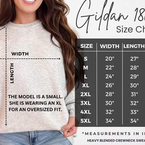 May include: Gildan 18000 Size Chart for a heavy blended crewneck sweatshirt. The chart shows measurements in inches for width, length, and sleeve length for sizes S through 5XL.