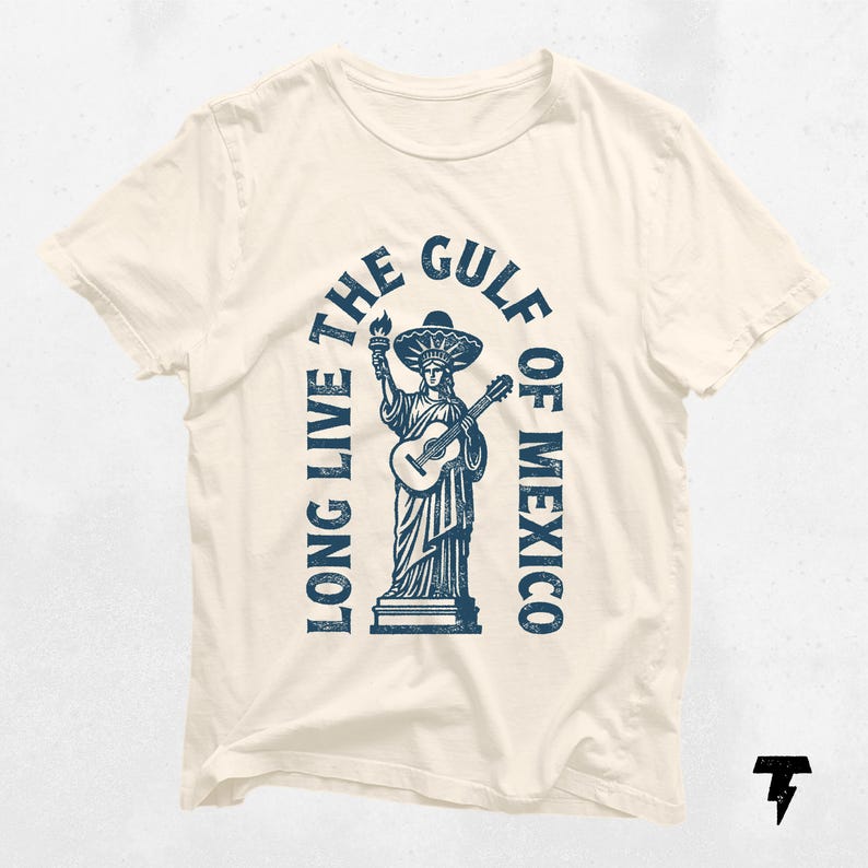 a t - shirt with a statue of liberty holding a guitar