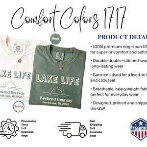 May include: Two Comfort Colors 1717 t-shirts in ivory and moss green. Each shirt features the text LAKE LIFE above a sun and wave graphic, with the text Weekend Getaway Torch Lake, MI 2026 below. The shirts have a crew neck and short sleeves.