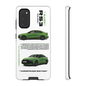 May include: White phone case with two green Audi RS3 car images. The case has the text "AUDI RS3 SALOON" and "KYALAMI GREEN" in green. The bottom of the case reads "VORSPRUNG EDITION".