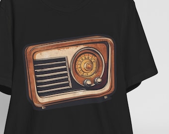 May include: Black t-shirt with a vintage radio graphic. The radio is brown with a gold dial and knobs.