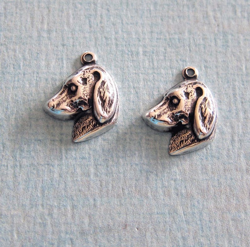 8 Dog charms silver plated A784