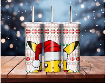 May include: Three stainless steel tumblers with a Christmas-themed design. The tumblers feature a white background with a red and green pattern, and a Pikachu character wearing a Santa hat. Each tumbler has a silver straw.