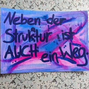 Painted and labeled postcards