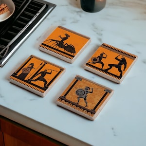 May include: Four orange and black ceramic coasters with Greek mythology inspired designs. Each coaster features a different scene with black silhouettes of figures and a decorative border.