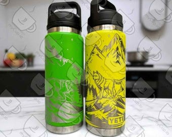 Yeti de 737 ml (26 oz) con diseño de lobos y montañas y tapa de rosca.