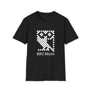 May include: Black t-shirt featuring a white graphic of an owl made of dots, with the text "BBC Micro" below. The short-sleeved shirt is made of a soft material and is suitable for casual wear.