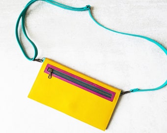 Yellow leather clutch wallet with phone pocket and detachable strap, sleek and stylish travel accessory - the Vera Bag in Lemon by Lolafalk